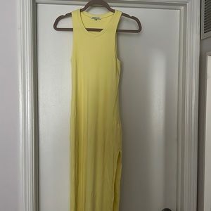 Midi tank dress whit a side slit .